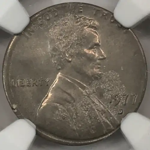 1977 STRUCK ON 10C BLANK (2.3g) (2)